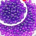 Close-up of 8mm translucent purple round glass beads for DIY jewelry and bracelet making - Dark Purple