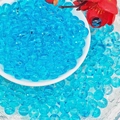 Macro shot of sky blue transparent 8mm round glass beads for DIY jewelry making - Peacock Blue