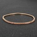 Sparkling rose gold tennis bracelet with round champagne cubic zirconia stones - Gold