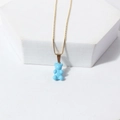 Delicate gold chain necklace featuring a glossy light blue bear pendant charm - Dark Blue