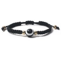 Μποέμ μαύρο πλεκτό βραχιόλι με χάντρα evil eye και χρυσές μεταλλικές λεπτομέρειες - Μαύρο