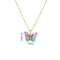 Collana in acciaio al titanio con ciondolo a farfalla sfumata viola e catenina dorata - Farfalla Stellata Brillante Multicolore