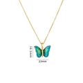 Collana a farfalla in titanio con ali in smalto blu-verde e dettagli in zirconi - Farfalla con Brillantini Blu Verde