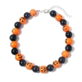 Close-up of Halloween necklace with orange Jack-o'-lantern pumpkin beads and lobster clasp - Necklace