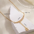 Gold plated moon and star pendant necklace with micro-pave cubic zirconia crystals - Gold