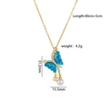Collar de mariposa de titanio con alas azules y borla de perlas en tono dorado - Estilo Mariposa Azul Oro (A2171)
