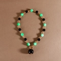 Korte kralenketting met groene en zwarte kralen, gouden bamboe details en OT-sluiting - Groen