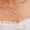 Elegant silver square perfume bottle pendant necklace with zircon halo on model - White Square Zirconia Necklace (A1228)