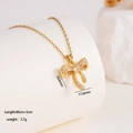 Gold bow pendant necklace with zircon crystals and dimensions 16.6mm x 17.6mm - Bowknot (1663)