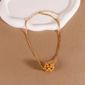 Elegant multi-strand gold chain necklace featuring clustered beads and lobster clasp - Yellow