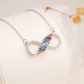 Silver infinity necklace featuring rainbow baguette stones and white zircon accents - Silver Bow Infinity Rainbow Style (2550)