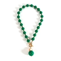 Smaragdgroene kralenketting met gouden T-sluiting en bolvormige hanger - Groen