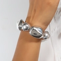 Exaggerated silver chunky bracelet with textured and polished irregular metallic beads - Silver Irregular Beaded Bracelet (NK27210)
