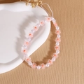 Cinturino per telefono con perline bianche e fiori arancioni su vassoio ceramico - Stile Fiore d'Arancio / Rosa