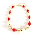 Christmas necklace with festive red, white, and gold textured beads and lobster clasp - Red
