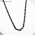Dettaglio di una catena a maglie cilindriche nere in acciaio inossidabile per uomo - 3mm Spessore 55CM Lungo / Nero