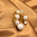 Anello a spirale dorato da donna con perle e cristalli su lussuosa seta dorata - Stile Strass Perla a Spirale Multistrato (JZ-YS473)