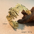 Detailed close-up of golden sunflower bangle with metal texture and sizing info - Daisy Sunflower Head Style (SS-YS110-1)