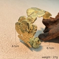 Detailed view of irregular gold floral cuff bracelet with a 6.1cm diameter measurement - 3D Carved Multi-Flower Style (SS-YS081-G)