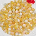 Macro view of 10mm resin cat-eye beads in yellow, white, and pink for DIY jewelry - Yellow Pink Gray (2#)