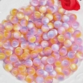 Macro shot of 10mm resin cat-eye beads in pink and purple gradients for DIY jewelry - Pink Yellow Purple (3#)