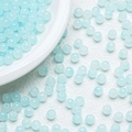 Macro shot of 6mm-8mm light blue gradient translucent glass beads for DIY jewelry - Blue Gradient (A2)