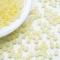 Macro shot of 6mm cream yellow gradient round beads for DIY jewelry making - Lemon Yellow (A4)