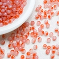 Macro shot of 8mm orange and white gradient jelly glass beads for DIY jewelry making - Orange Gradient (A5)