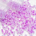 Macro shot of purple glass beads with gold foil flakes poured from clear jars for DIY jewelry - Ink Wash Gold Foil Style (A204) / 8mm / Purple