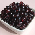 Macro shot of 8mm deep red translucent glass beads for DIY jewelry making and beading - 8mm / Vermilion
