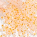 Macro shot of 8mm orange ink-gold glass beads pouring from bottles for DIY jewelry - Ink Wash Gold Foil Style (A211) / 8mm / Orange