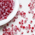 Macro shot of 8mm pink and red gradient glass beads for DIY bracelet jewelry making - Red Gradient (A15)