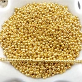 Macro detail of gold plated spacer beads for DIY jewelry with clear center drill holes - 100pcs/Pack (P22#) / 3.2mm / Gold