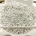 Close-up of polished silver metal spacer beads for DIY jewelry making in a white bowl - 1 Piece (P21#) / 2.4mm / Silver