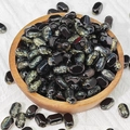 Macro view of 6x10mm black and gold lampwork glass beads in a wooden bowl for DIY jewelry - 50 Pieces/Pack (6x10mm) / Ink Color (K31)