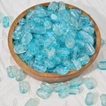 Close-up of sky blue rectangular glass beads with ice crackle texture in a wooden bowl - 50 Pieces/Pack (6x10mm) / Light Blue (K39)