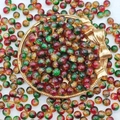 Macro shot of festive red, green and gold glass beads with gold foil inside for DIY jewelry - 10mm (Christmas Crackle Beads H81#) / Christmas Mix (Red/Yellow/Green)