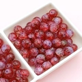 Macro detail of red-purple cracked glass beads for Christmas DIY jewelry making - Opal Red Crackle (10mm-M24#)