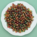 Macro detail of red green and gold crackle glass beads in a white ceramic dish - 8mm (Christmas Crackle Beads B37#) / Christmas Mix (Red/Yellow/Green)