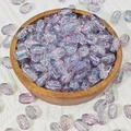 Macro detail of 6x10mm purple and blue gradient glass beads with glitter in a wooden tray - Ice Purple (K42)