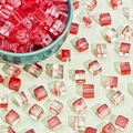 Macro detail of red square glass beads for Christmas DIY bracelets and jewelry making - Red Cube Bead (7mm-3#)