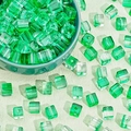 Macro shot of 8mm-10mm green translucent cube glass beads for DIY jewelry making - Green Cube Bead (7mm-12#)
