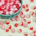 Primo piano di perline di vetro sfumate rosa e rosso in una ciotola per gioielli DIY - Gradiente Rosso (A15#)