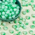 Detail of 8/10mm translucent green glass beads for DIY jewelry and necklaces - Two-Tone Emerald Green (A20#)