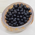 Close-up of polished black round glass beads in a stone bowl for DIY jewelry making - 8mm (1.6mm Hole) / Black