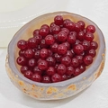 Macro shot of 8mm deep red chalcedony beads with glass luster for DIY jewelry making - 4mm / Garnet Red
