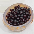 Macro shot of 4-8mm deep red translucent glass beads in a jade chalcedony bowl - 8mm (1.6mm Hole) / Vermilion