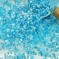 Close-up of mixed blue glass seed beads and tube beads for DIY jewelry making - Blue (M753)