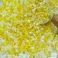 Assorted yellow DIY glass seed beads spilling from a jar for jewelry making - Yellow (M758)