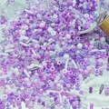 Detailed view of assorted purple DIY glass seed beads and tubes for jewelry making - Purple (M759)